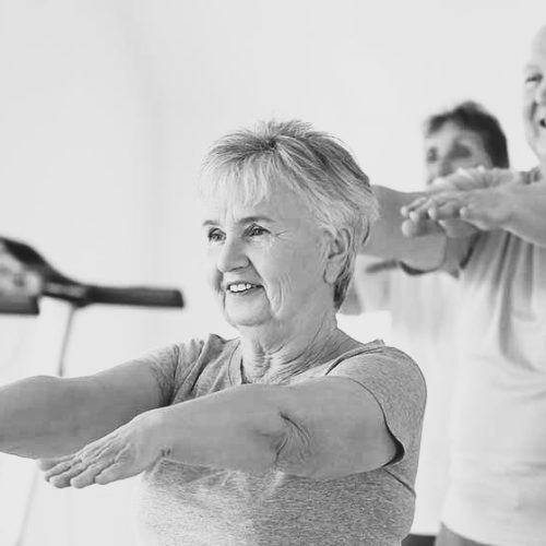 group-of-elderly-people-doing-exercises-in-gym